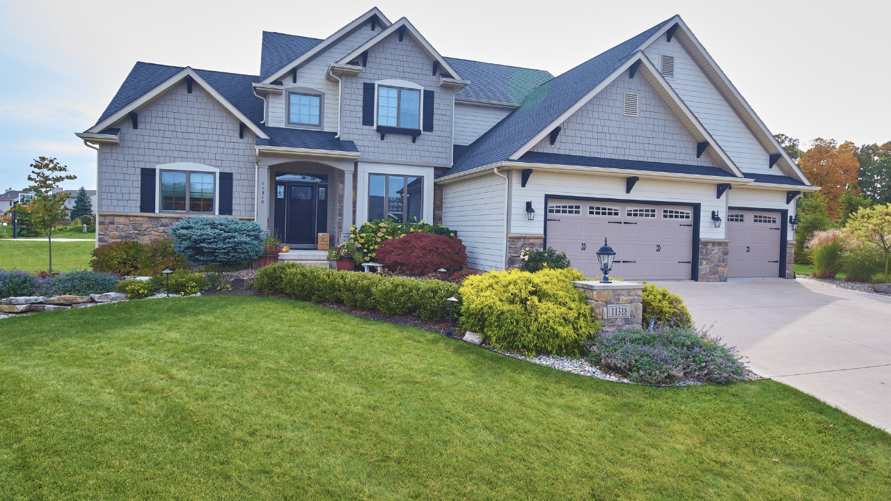 Traditional suburban house with beautiful landscaping