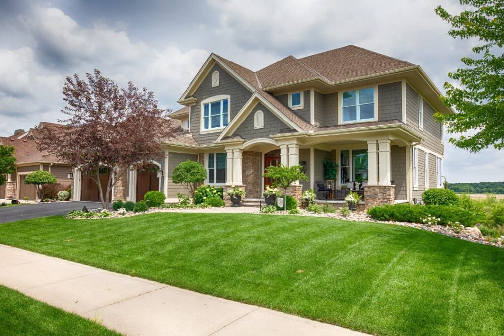 A home with a beautiful landscaped front yard