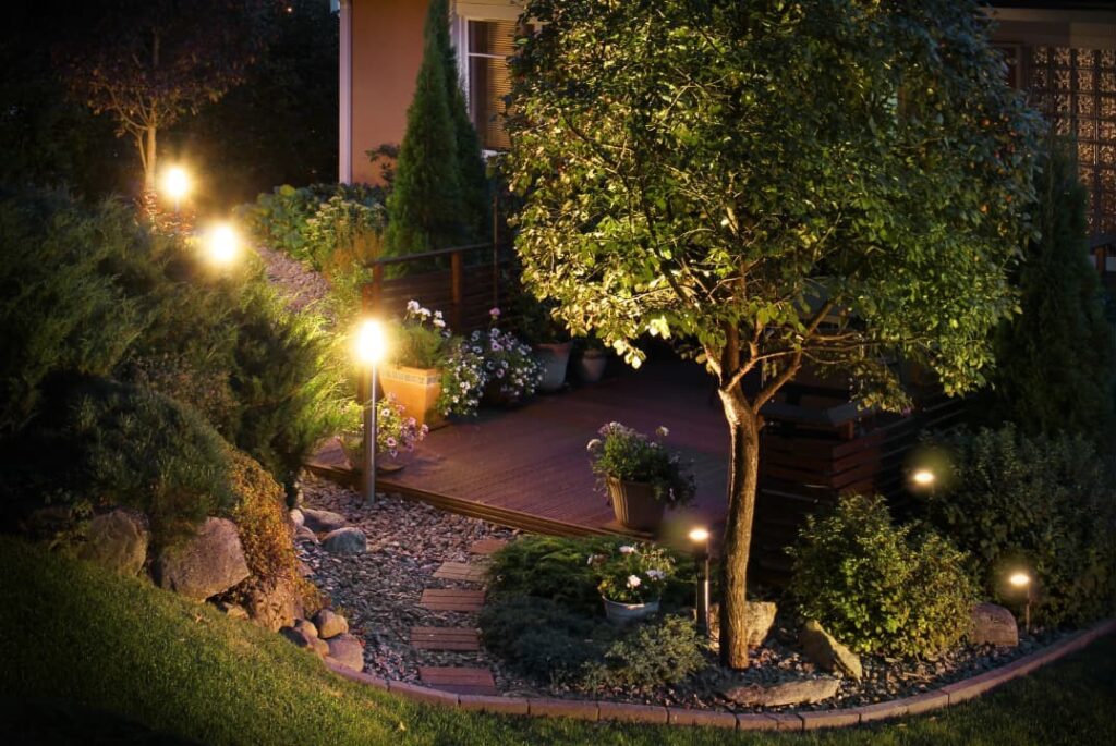 An illuminated garden path patio