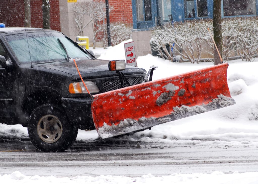 Snow plow truck on the streets