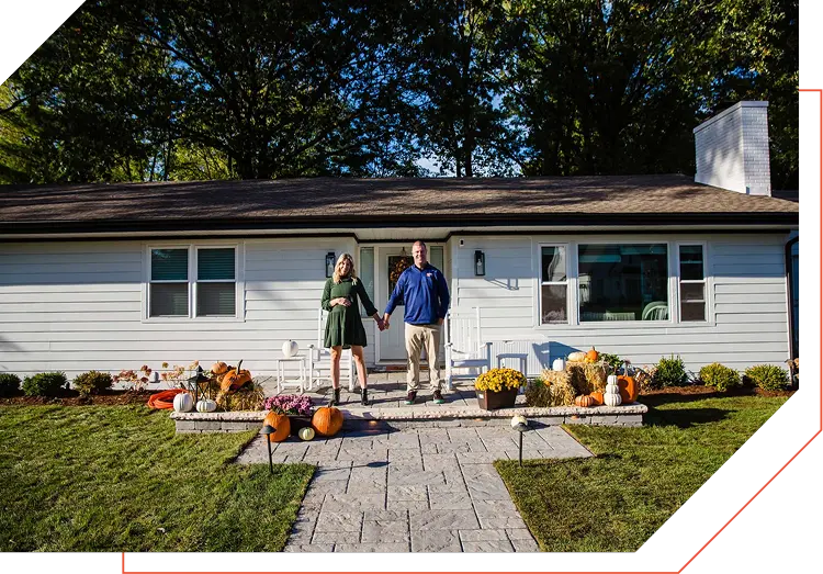 family outside house