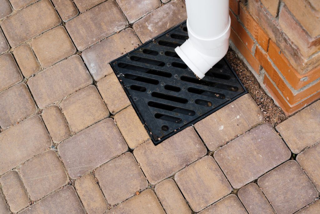 cast iron drainage system in a pavement. Is used for drainage and separation of water.
