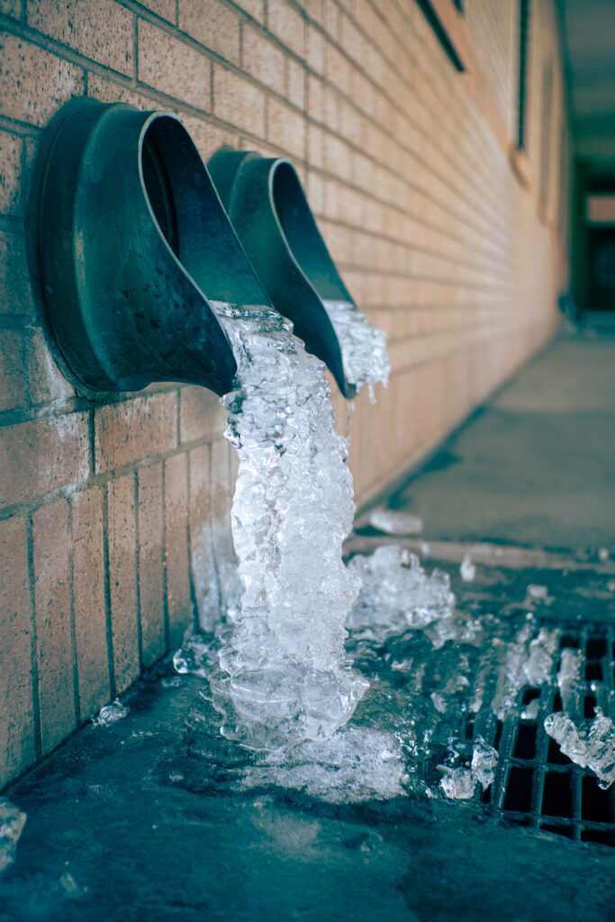 Water pouring into drainage.